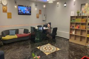 TV a/nebo společenská místnost v ubytování Hotel Dlima Inn Bukit Bintang