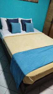 Postel nebo postele na pokoji v ubytování Hotel Los Rivera
