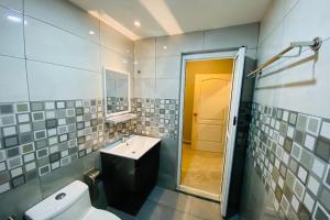 Koupelna v ubytování Hotel Dlima Inn Bukit Bintang