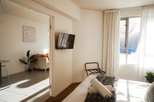 Μια τηλεόραση ή/και κέντρο ψυχαγωγίας στο Affordable Seaview Getaway
