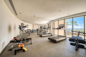 a gym with treadmills and exercise equipment in a building at Puerta Cortés Vistamar by Lumina in La Paz +25 photos