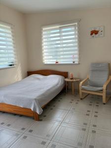 Postel nebo postele na pokoji v ubytování SweetHome