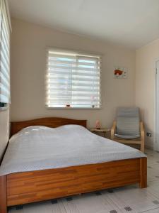 Postel nebo postele na pokoji v ubytování SweetHome