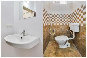 a bathroom with a sink and a toilet at Super Townhouse Hitech City Madhapur in Hyderabad +23 photos