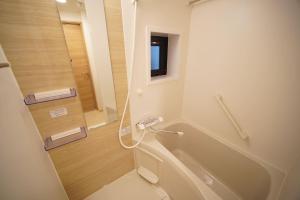 Koupelna v ubytování DL Shinsaibashi + 19 fotografií