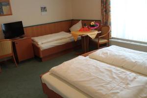 Postel nebo postele na pokoji v ubytování Hotel Ideal