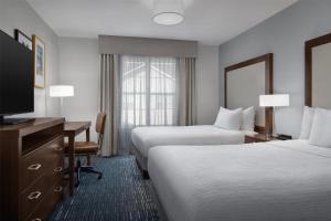 Homewood Suites by Hilton Newark-Cranford客房内的一张或多张床位