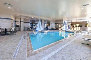 a large swimming pool in a hotel room at Cambria Hotel Pittsburgh - Downtown in Pittsburgh