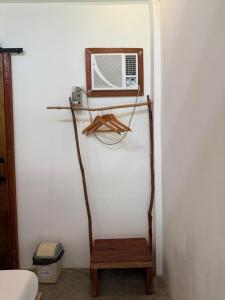 a room with a table with a radio on a shelf at NAYANAYA Villas Siargao in General Luna +95 photos