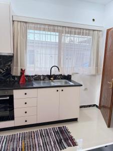 Kuchyň nebo kuchyňský kout v ubytování Apartament Drasa 2