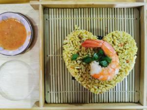 a heart shaped bowl of rice with shrimp on it at Ryokan AI Japan Friend - Free Hotsprings & Massage in Kuala Lumpur