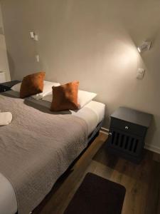 Postel nebo postele na pokoji v ubytování Hotel Plaza Sky
