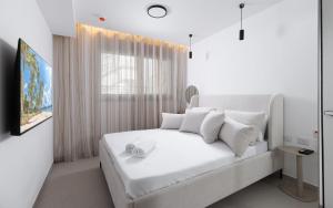 Postel nebo postele na pokoji v ubytování סוויטת השחר