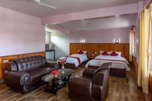 Ένα ή περισσότερα κρεβάτια σε δωμάτιο στο Hotel Monalisa Chitwan