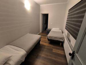 Postel nebo postele na pokoji v ubytování Hotel Plaza Sky