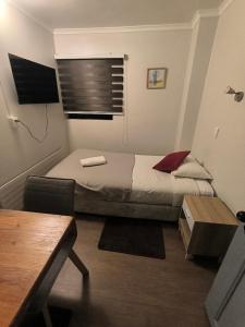 TV a/nebo společenská místnost v ubytování Hotel Plaza Sky