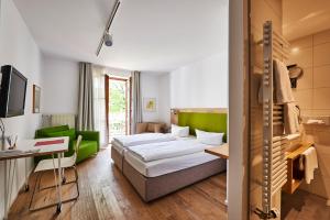 Letto o letti in una camera di Fuchsbräu