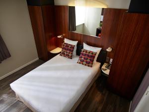 Postel nebo postele na pokoji v ubytování Gosset Hotel