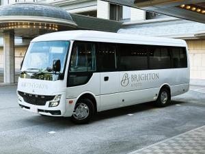 a white bus parked in front of a building at Kyoto Brighton Hotel in Kyoto +116 photos