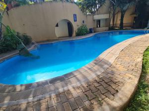 Bazén v ubytování Spring Hills Apartment in Kampala nebo v jeho okolí