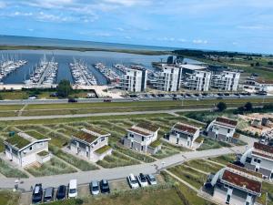 an aerial view of a city with a marina at Ferienwohnung Ostseetraum in Wendtorf