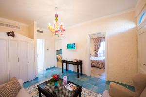 A bed or beds in a room at St.George's Bay Country Club & Spa