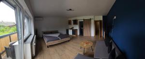 Postel nebo postele na pokoji v ubytování Grmač Apartments