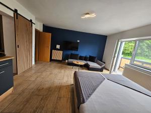 Postel nebo postele na pokoji v ubytování Grmač Apartments