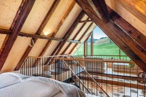 Ένα ή περισσότερα κρεβάτια σε δωμάτιο στο Haus am See Backhäusle