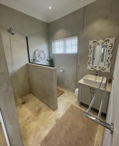 Et badeværelse på Olyvenbosch Selfcatering