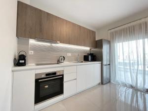 Η κουζίνα ή μικρή κουζίνα στο Athenean Cultural Retreat Stavros Niarchos