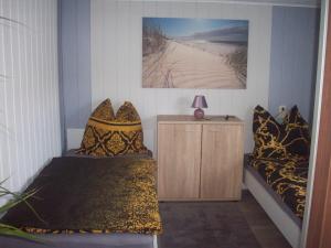 Ένα ή περισσότερα κρεβάτια σε δωμάτιο στο Ferienhaus Gienau