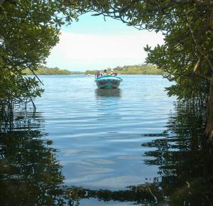 a group of people in a boat on a lake at Viyan hotel in Negombo