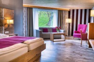 Postelja oz. postelje v sobi nastanitve Hotel Krone Langenegg