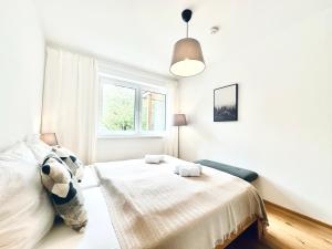 Rúm í herbergi á Apartment Frida by Da Alois