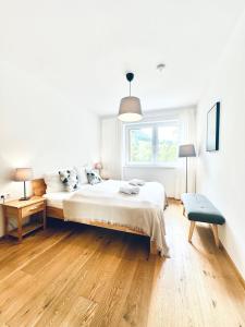 Rúm í herbergi á Apartment Frida by Da Alois