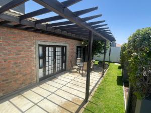 En have udenfor Olyvenbosch Selfcatering