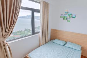 Postel nebo postele na pokoji v ubytování Napoleon Apartment SeaView
