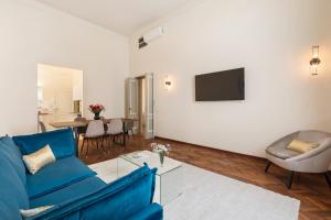 Μια τηλεόραση ή/και κέντρο ψυχαγωγίας στο Modena Boutique Apartment