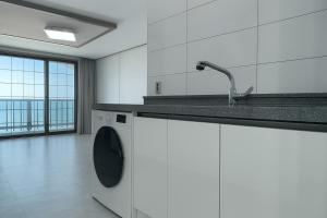 Η κουζίνα ή μικρή κουζίνα στο Taean Hagampo Rendezvous pension