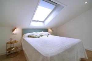 Postel nebo postele na pokoji v ubytování Ático en pleno centro de Portonovo, Sanxenxo