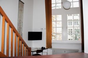 TV a/nebo společenská místnost v ubytování GLS Studio Hotel Berlin