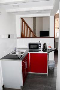 Kuchyň nebo kuchyňský kout v ubytování GLS Studio Hotel Berlin