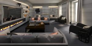 a living room with a couch and a fireplace at Orazio Palace Hotel in Rome