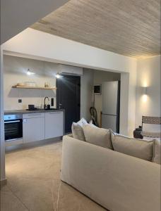 Kuchyň nebo kuchyňský kout v ubytování Komi Beach Apartment