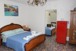 Letto o letti in una camera di Palma Verde