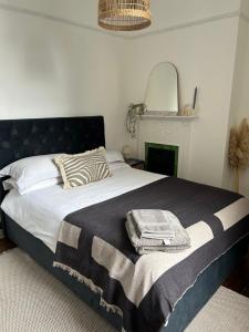 Ένα ή περισσότερα κρεβάτια σε δωμάτιο στο Stunning 1-bed flat in heart of Tunbridge Wells