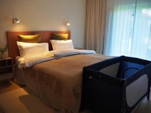 Katil atau katil-katil dalam bilik di Design-Apartment am Chiemsee