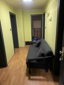 a bedroom with a bed in a room with green walls at Siegen Monteuren Wohnung 6 in Siegen