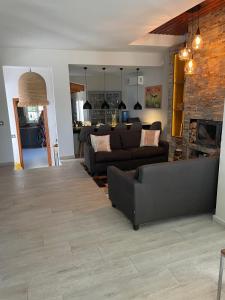 Posezení v ubytování Villa Compartida con Vistas al Mar y la Montaña